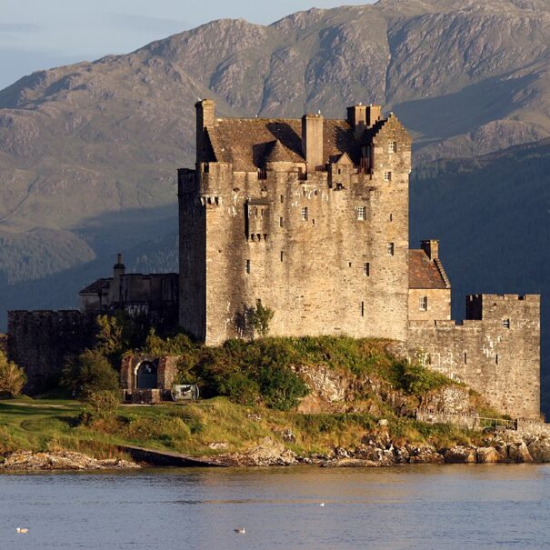 Eilean Donan castle, in the Scottish Highlands, seen at dusk.